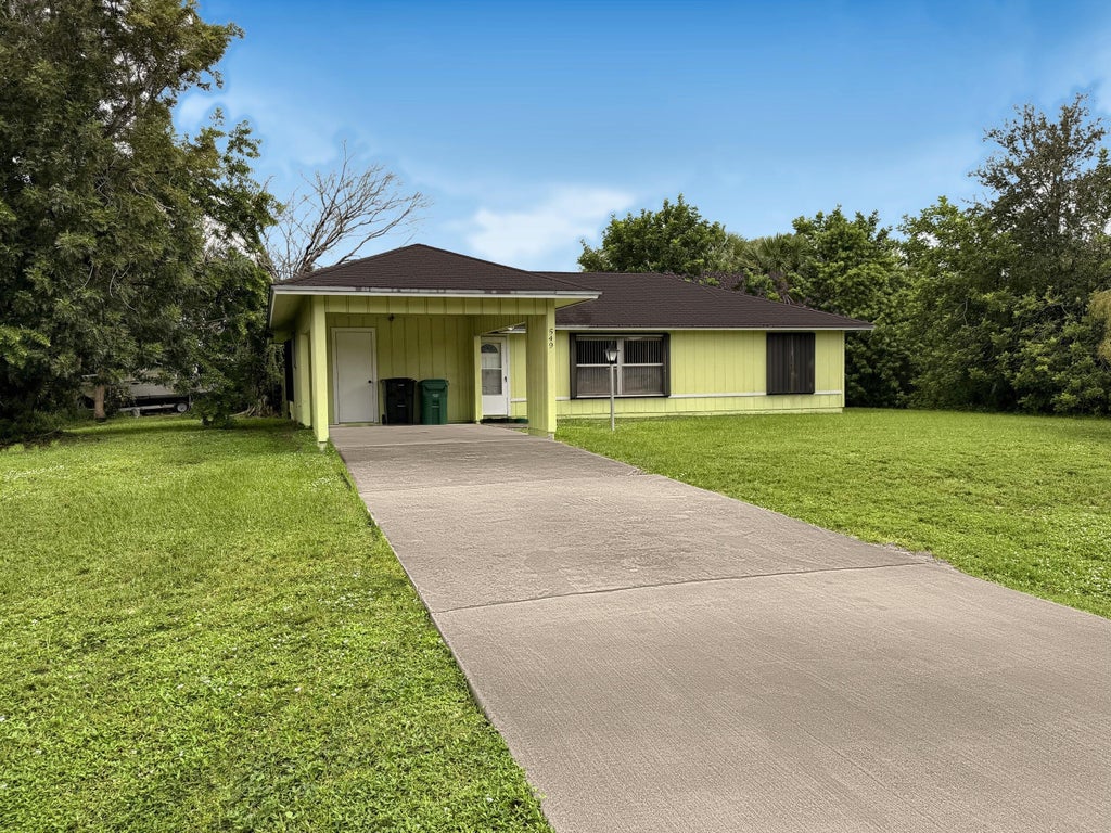 Photo of 549 NW BAYSHORE Boulevard, Port Saint Lucie, FL 34983 (MLS # B26086891)