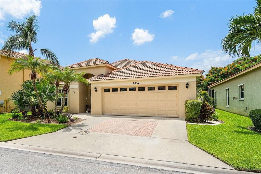 Photo of 2057 Bonisle Circle Cir, Riviera Beach, FL 33418 (MLS # R10820302)