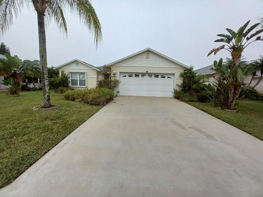 JUST REDUCED!! THIS IS A SPACIOUS 3/2/2 HOME IN An ACTIVE 55+ COMMUNITY PALM GROVE, NICE SCREEN PATIO WITH ACCORDIN SHUTTERS. CORPORATE OWNED, SEE SELLERS ADDENDUM. GATED COMMUNITY. FRESHLY PAINTED, NEW FLOORING. COMMISSION TO BE PAID ON NET SALES PRICE!!!!