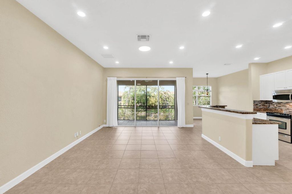 Photo of 8035 NW 127th Lane #3-e, Parkland, FL 33076 (MLS # B26010540)