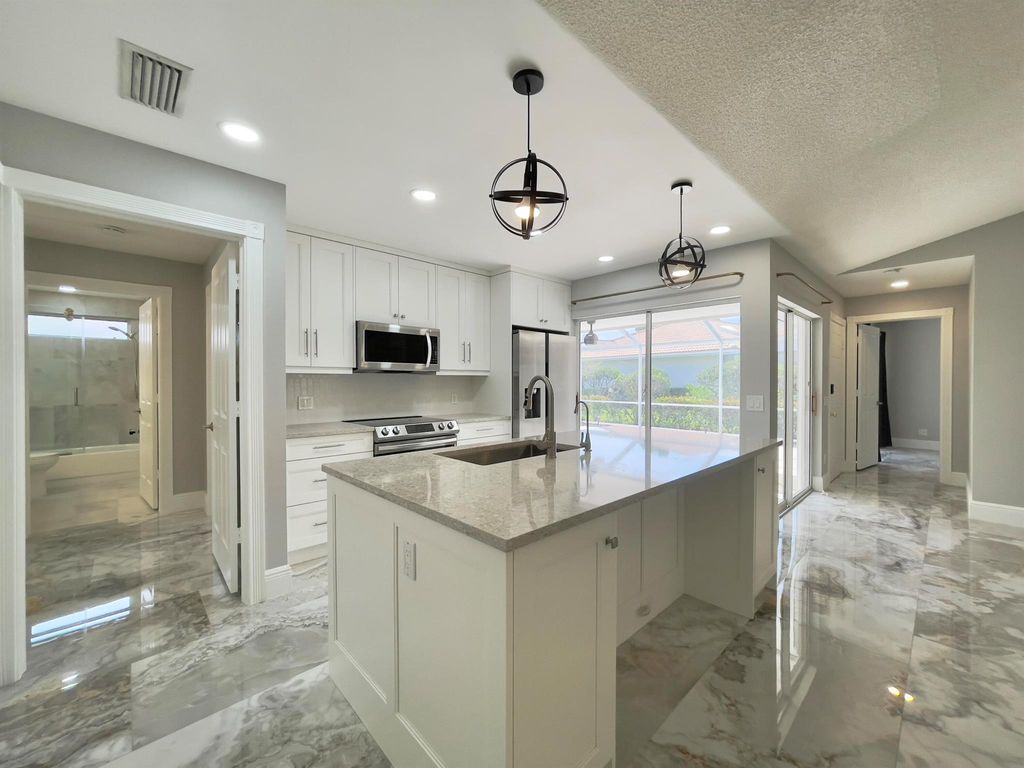 Photo of 6503 Geminata Oak Court, Palm Beach Gardens, FL 33410 (MLS # R11099056)