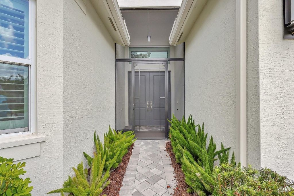 Photo of 11933 SW Hunter Hill Avenue, Port Saint Lucie, FL 34987 (MLS # F10446182)