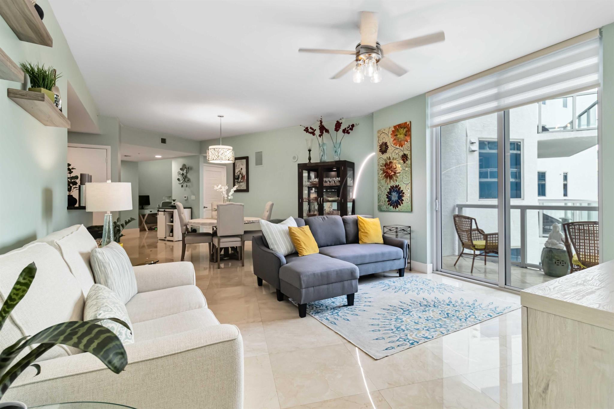 NO UPCOMING ASSESMENTS AND ALL ASSESSMENTS PAID! Welcome to an exquisite 2-bedroom + den, 2-bathroom condo that sets the standard for luxurious living. Offering 1,453 square feet of meticulously designed space, this move-in-ready residence features an abundance of upgrades and a prime location, making it the perfect sanctuary for a refined lifestyle. Step inside to discover marble tile flooring throughout, enhancing the sense of elegance and style. This community offers a wealth of amenities, including a sparkling pool, hot tub, fitness center, and conference room. Enjoy the added benefit of one assigned parking space, and two storage sheds, Pet-friendly and equipped with an HOA that covers basic cable, Wi-Fi, water, and sewer, this is hassle-free living at its finest.