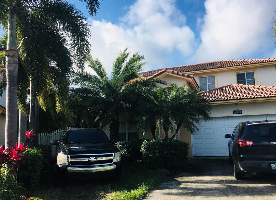 Well maintained 4bd/3ba, with 1/1 downstairs, master is upstairs. AC '24, accordion shutters, irregular lot gives the backyard extra patio for pool, oversize shed, pavers, privacy arecas. No HOA!! Huge living room can be split to make a formal living and a family room, separate dining room. Close to shopping, turnpike for easy commutes. Currently rented, long-term excellent tenants would like to stay but are M2M if purchasing for owner occ. space to park multiple cars, RV, boats, any/all.