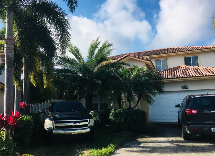 Well maintained 4bd/3ba, with 1/1 downstairs, master is upstairs. AC '24, accordion shutters, irregular lot gives the backyard extra patio for pool, oversize shed, pavers, privacy arecas. No HOA!! Huge living room can be split to make a formal living and a family room, separate dining room. Close to shopping, turnpike for easy commutes. Currently rented, long-term excellent tenants would like to stay but are M2M if purchasing for owner occ. space to park multiple cars, RV, boats, any/all.