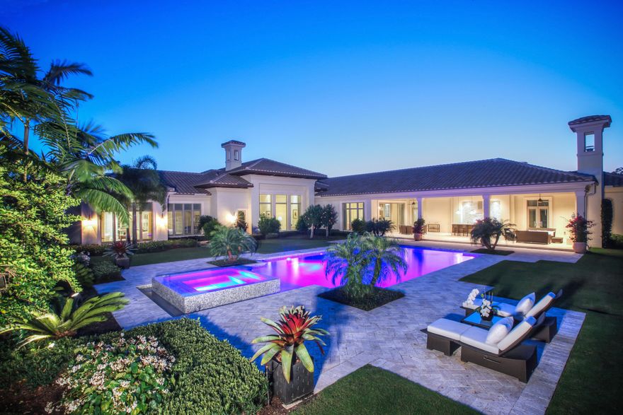 Impeccable custom estate home on a one acre home site with private preserve view.  This home was recently built in 2015 and features an open, light and bright floor plan with marble and wood floors, beautiful wood details, handsome study, 200 bottle wine storage, two master bedrooms and two master baths, fireplace, built in wall units and private guest suite.  The backyard boasts a custom infinity edge pool and spa, outdoor summer kitchen, covered and open lanai, cypress ceilings and tropical views of paradise.