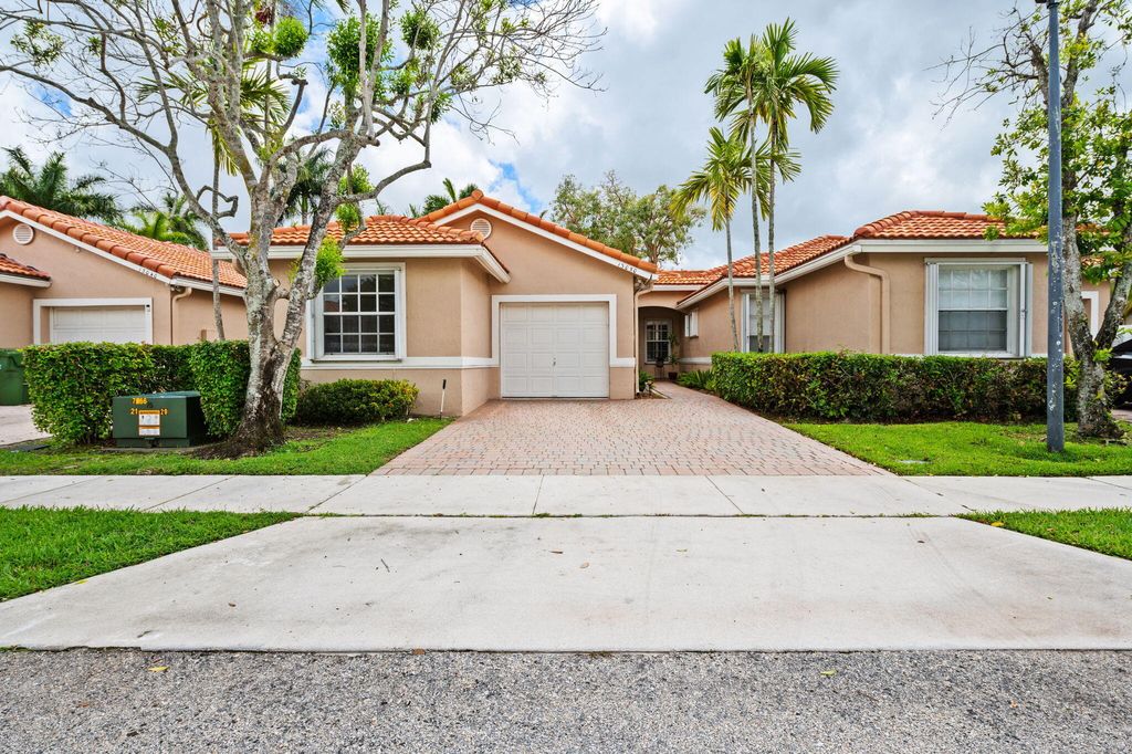 Photo of 13050 NW 5th Street, Pembroke Pines, FL 33028 (MLS # B26014085)