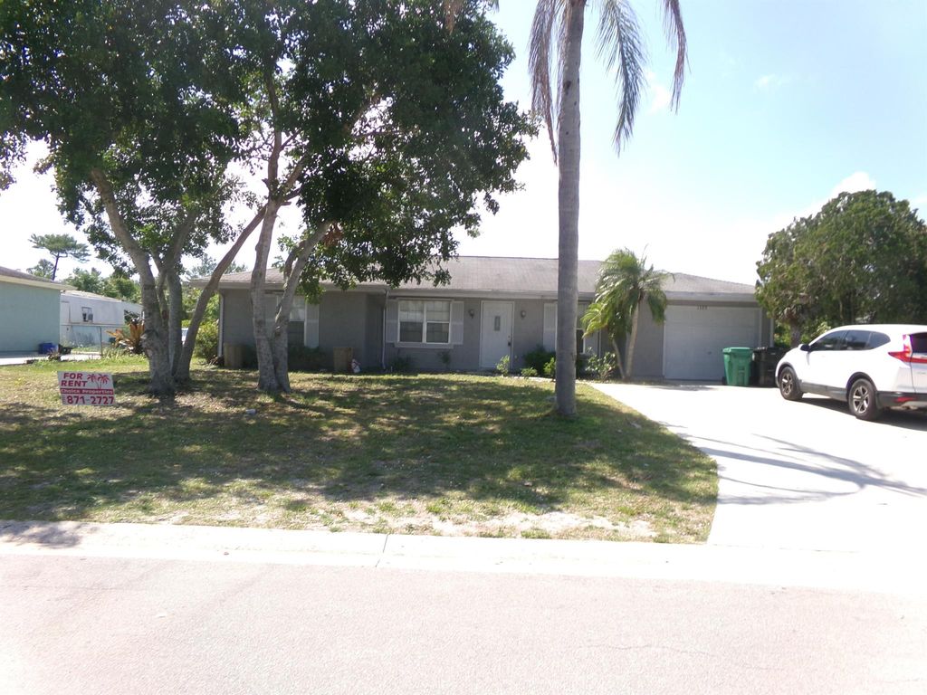 Photo of 1380 SE Buckingham Terrace, Port Saint Lucie, FL 34983 (MLS # R11077025)