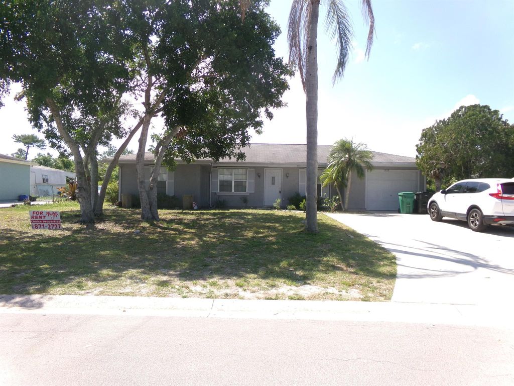 Photo of 1380 SE Buckingham Terrace, Port Saint Lucie, FL 34983 (MLS # R11077025)