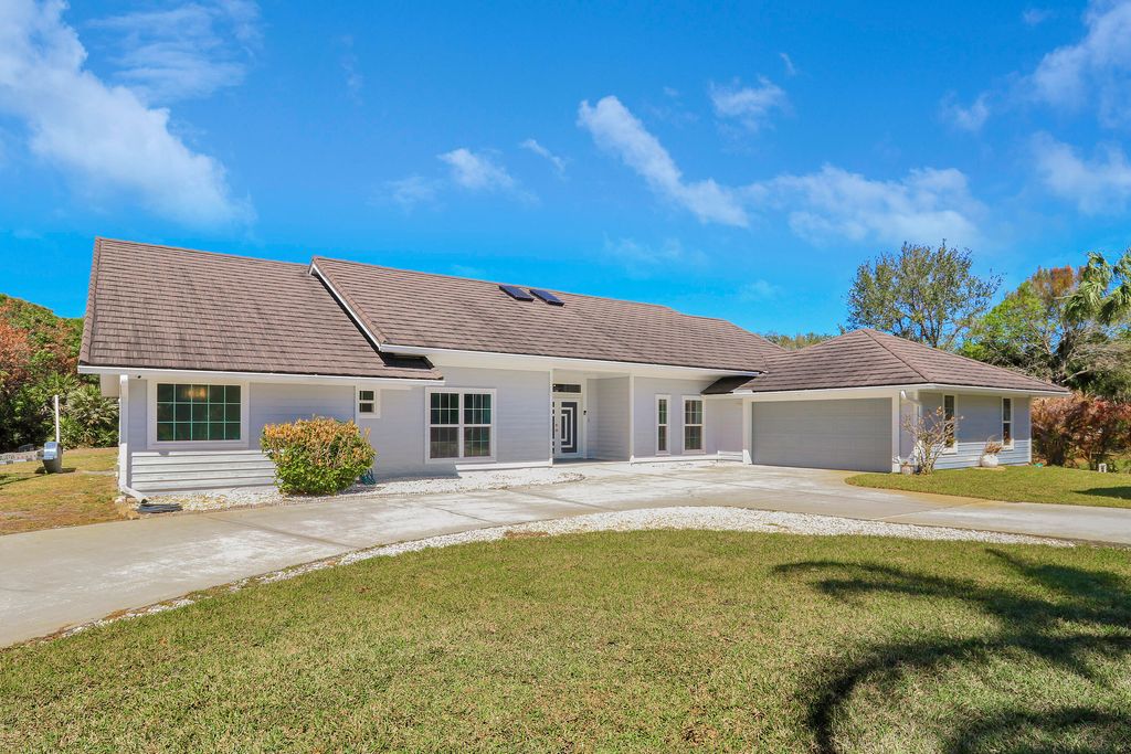 Photo of 815 NE Stokes Terrace, Jensen Beach, FL 34957 (MLS # R11166766)