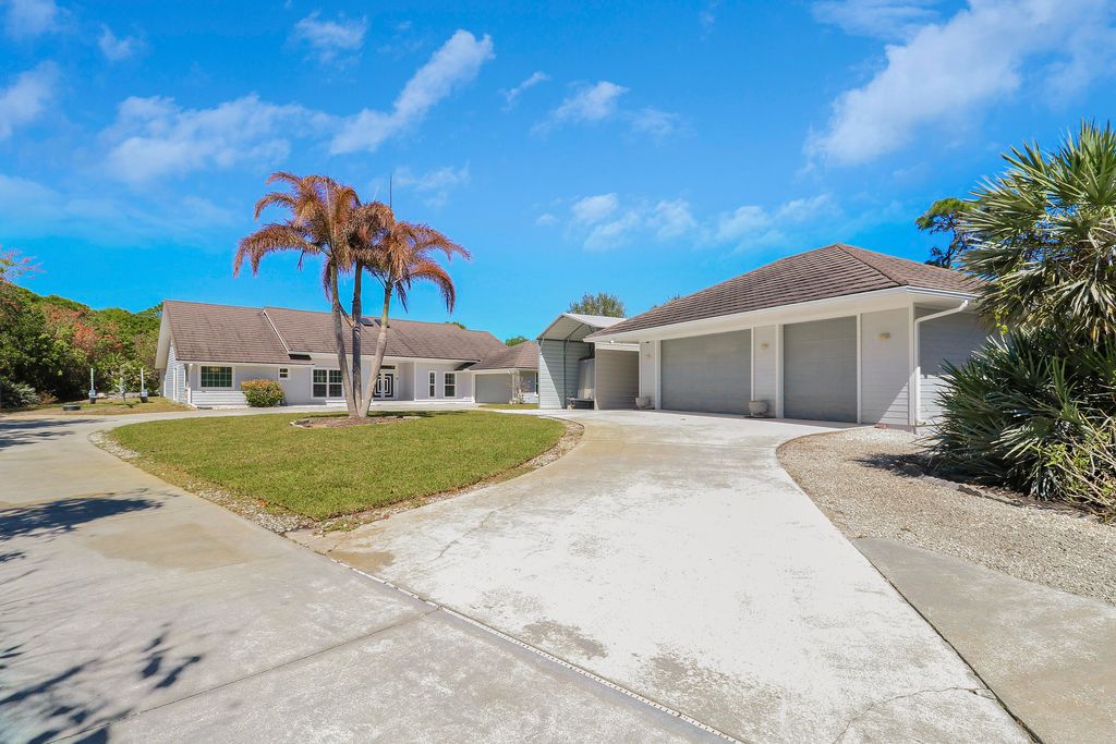 Photo of 815 NE Stokes Terrace, Jensen Beach, FL 34957 (MLS # R11166766)