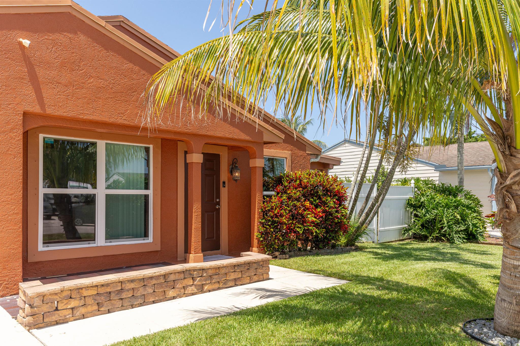 CHARMING WELL-KEPT HOME WITH VAULTED CEILINGS & TILED FLOORS IN LIVING ROOM & KITCHEN. MOST OF THE GARAGE HAS BEEN ENCLOSED FOR 4TH BEDROOM OR DEN/OFFICE. HVAC INSTALLED 2022 AND WATER HEATER 2025. NEWLY BUILT 1/1 EFFICIENCY IN THE BACK.