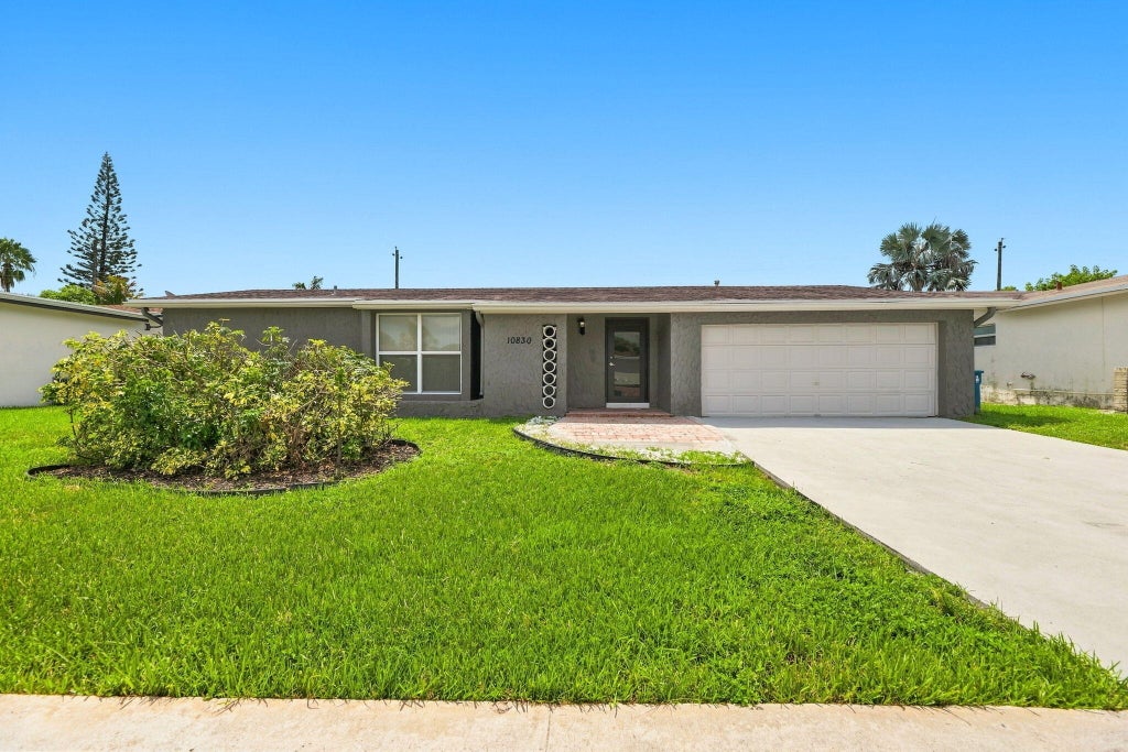 Photo of 10830 NW 29TH Court, Sunrise, FL 33322 (MLS # B26072579)