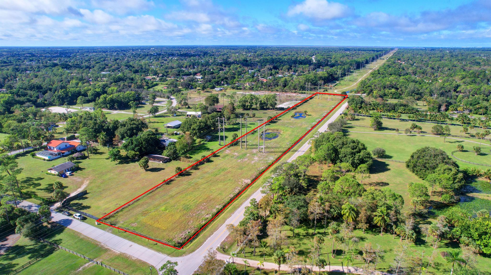 Owner Financing available. Unique opportunity to explore equestrian paradise in Little Ranches! This exclusive 4.3 acre plot, mere minutes from Wellington's premier equestrian venues, is cleared and ideal for pastures or riding. With potential to convert to agricultural zoning, this is a savvy investor's dream. Embrace the opportunity to own prime land in Wellington's sought after community. This listing is for land only. Schedule a viewing and envision the possibilities on this blank canvas.