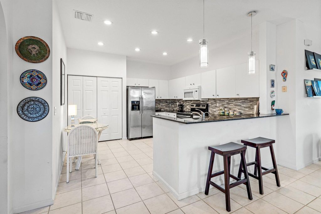 Photo of 5851 Island Reach Lane, Boynton Beach, FL 33437 (MLS # R11147877)