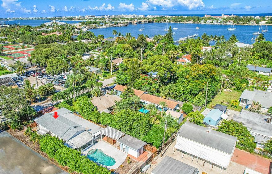 Live the Lantana lifestyle! Just steps from the Intracoastal and the iconic Old Key Lime House, this 4-bedroom, 3 bath pool home offers true coastal charm. Enjoy an open layout, tropical backyard with pool, and a private master suite with its own hot tub. Walk to waterfront dining, marinas, and local shops — everything you love about Florida living is right outside your door. Recent upgrades include a new roof (2024), Atlantic Filter Water & Carbon Systems (2024), tankless water heater, 500-gal in-ground gas tank, 20KW generator, and 4-ton A/C (2022). All this is located less than a mile from the beach and minutes from shopping and restaurantsyour perfect slice of Florida paradise!