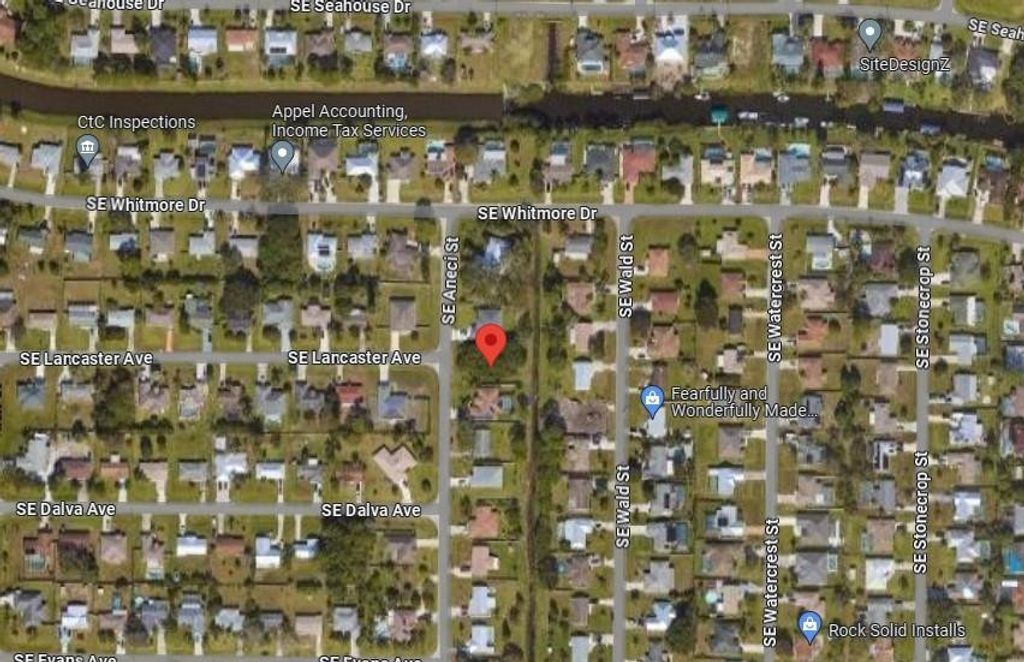Photo of 2049 SE Aneci Street, Port Saint Lucie, FL 34984 (MLS # F10430013)