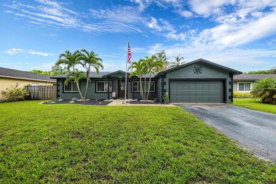 2025 Roof, A/C, and Hot Water Heater! Rarely available Cooper City home with no HOA, located just steps from the park. Inside, you'll find premium waterproof vinyl flooring in all three bedrooms, updated bathrooms with modern finishes, and a kitchen with stainless steel appliances. Two spacious living areas and a dining room offer plenty of space to gather. Step outside to your private backyard paradise, complete with private landscaping, a large pool, and an outdoor pavilion with electricity, perfect for entertaining. Close to top-rated schools, parks, and major roads. Don't miss this one!