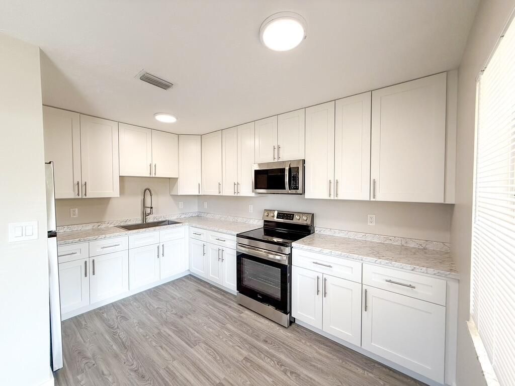 Photo of 710 N G Street #1, Lake Worth Beach, FL 33460 (MLS # R11032825)