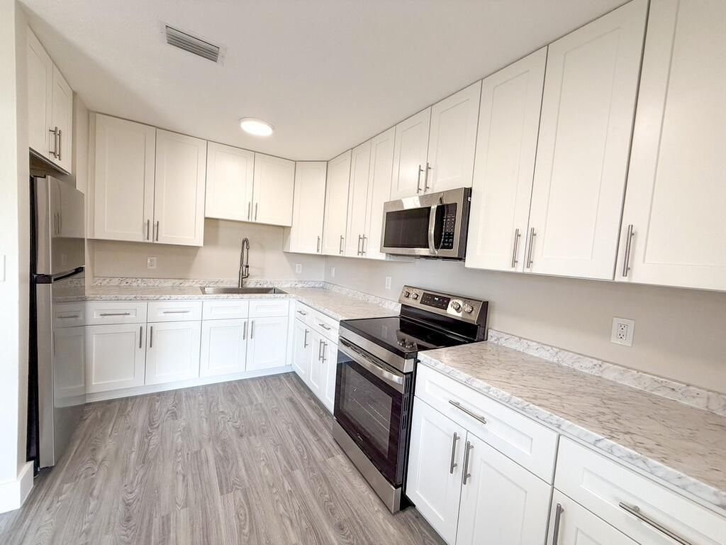 Photo of 710 N G Street #1, Lake Worth Beach, FL 33460 (MLS # R11032825)