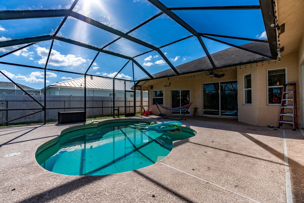 Photo of 6147 NW East Deville Circle, Port Saint Lucie, FL 34986 (MLS # R11152495)