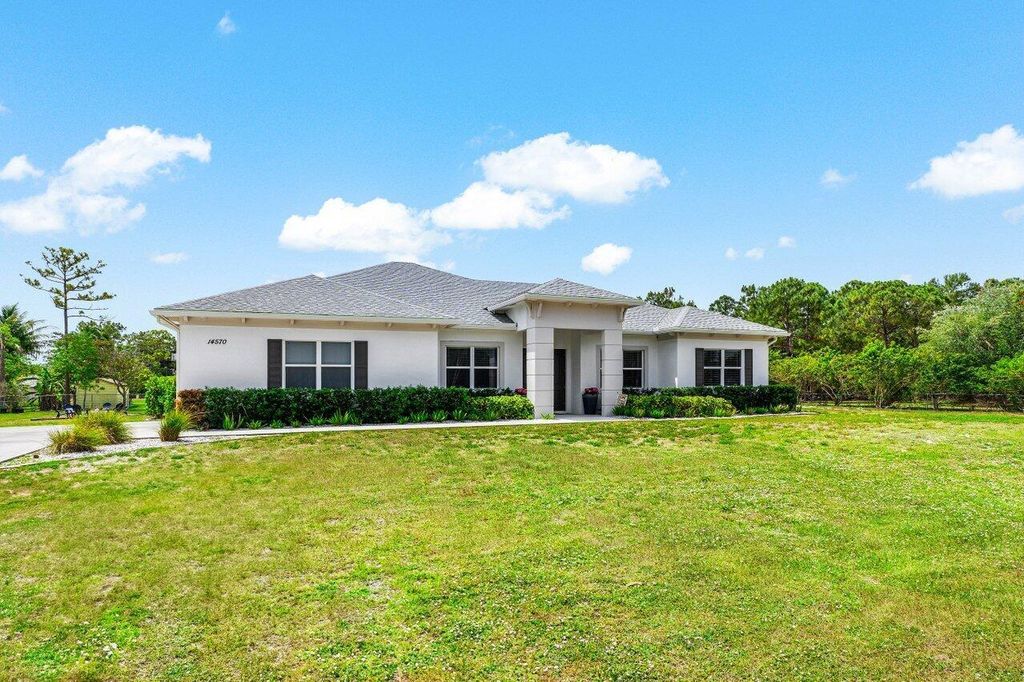 Photo of 14570 85th Road N, The Acreage, FL 33470 (MLS # R11086095)