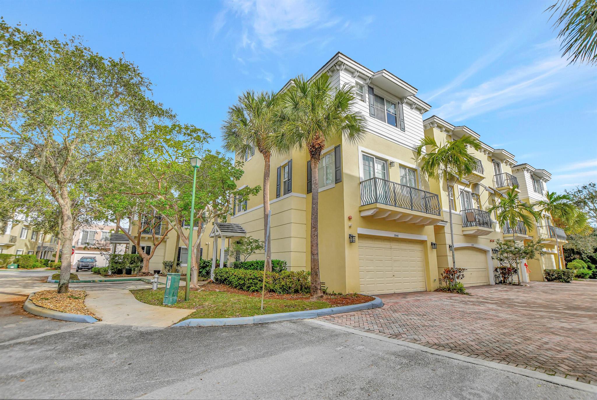 Price Reduced! Motivated Seller! Welcome to Vistazo in east Boca Raton! This exquisite 3-story corner townhouse offers the perfect blend of luxury, convenience and coastal living. Walking distance to FAU & Palm Beach College and just a short drive to Mizner Park in Downtown Boca Raton & Boca's pristine beaches. With three stories of living space, including spacious bedrooms & bathrooms, this townhouse provides comfort and privacy. The well-appointed kitchen & dining area are perfect for entertaining. Convenience is key with a 2-car garage, ensuring both security for your vehicles and added storage space. Amenities include 2 renovated heated pools and spa & renovated fitness center with all the perks!