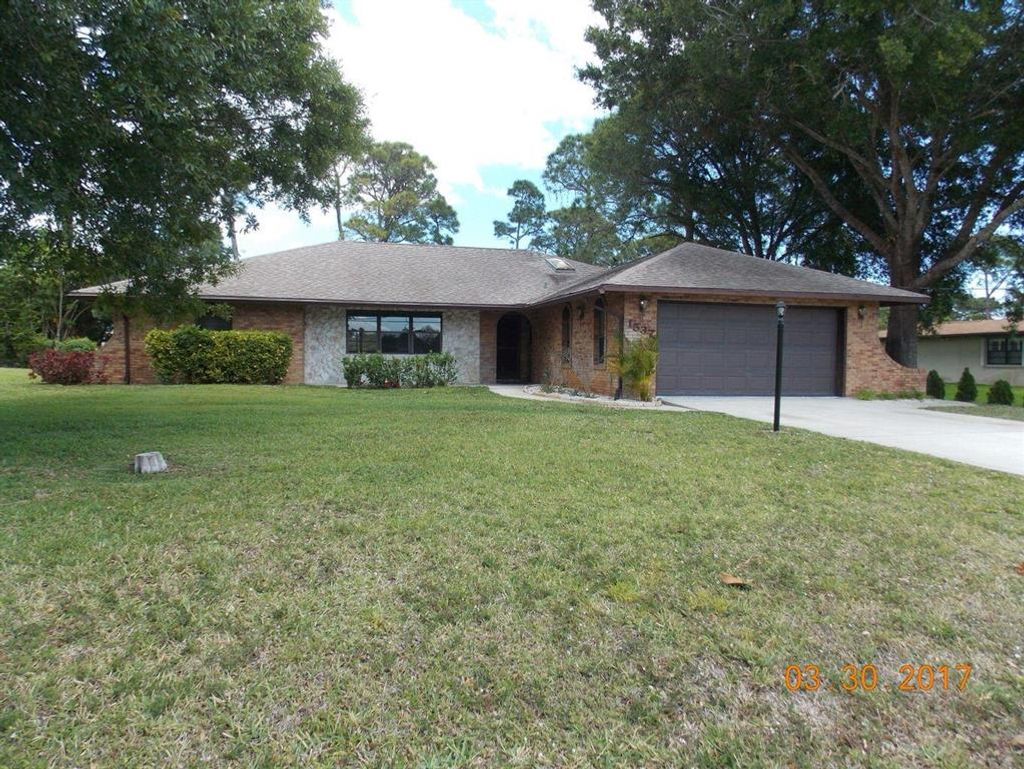 Photo of 1537 SE Blockton Avenue, Port Saint Lucie, FL 34952 (MLS # R10794967)