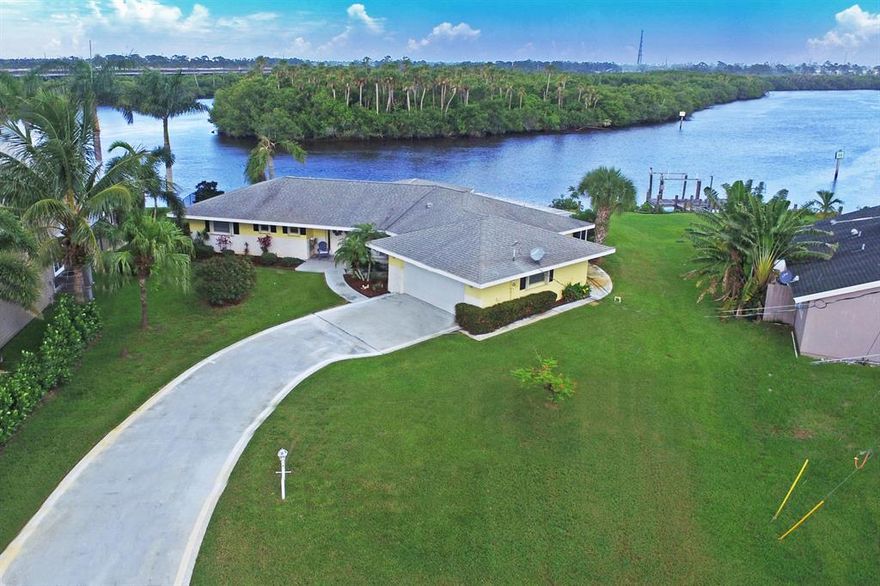 One of the most scenic views on the St. Lucie River, this home takes advantage of every view. Classic ''Old Florida'' in impeccable condition on an oversized lot and includes dock and seawall. Conveniently located within a short distance to the Florida Turnpike.
