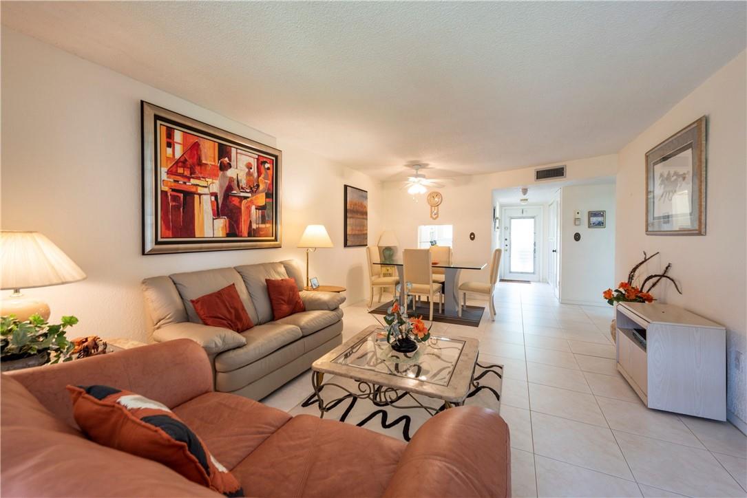 Rarely available first floor unit, parking spot in front of unit in the 55+ Community of Sunrise Lakes. Large well maintained 2 bedroom/2 bath condo with a relaxing lake view. Convenient to the laundry room. Enclosed spacious Lanai for relaxation with an extra exit door. Tile floor through out and laminate floor in the bedroom. Large walk-in closets in both bedrooms. Enjoy the endless amenities that Sunrise Lakes has to offer, large swimming pools, tennis, golf, gym , theater , complimentary bus for shopping and more. Great location close to Sawgrass Mills Mall, restaurants, shopping and other services.
