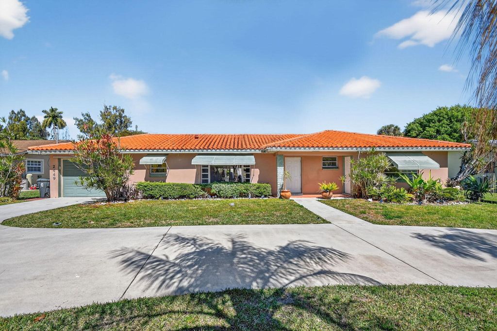 Photo of 2449 Gertrude Drive, Lake Worth Beach, FL 33462 (MLS # R11166930)