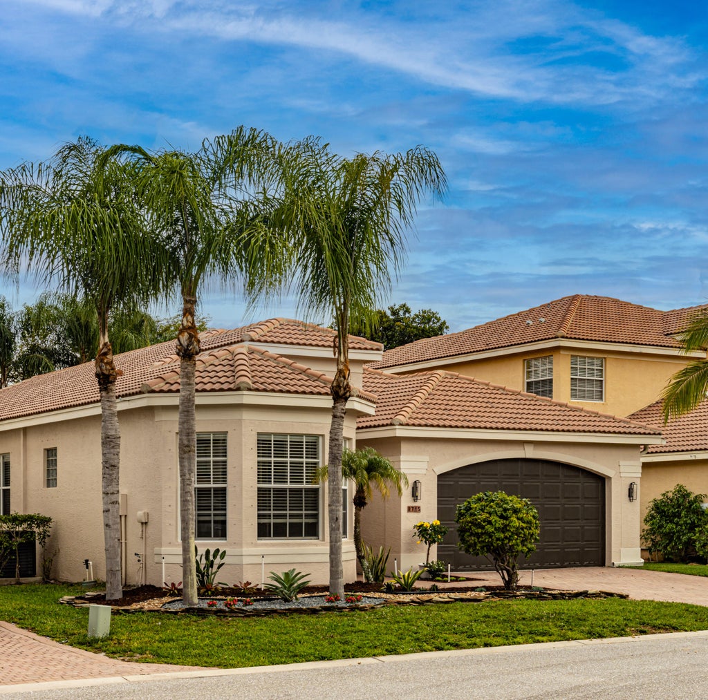 Photo of 8715 Woodgrove Harbor Lane, Boynton Beach, FL 33473 (MLS # R10795956)