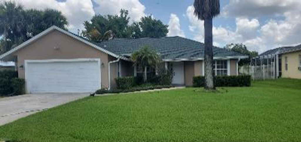 Photo of 2342 SE Maslan Avenue, Port Saint Lucie, FL 34952 (MLS # R10735250)