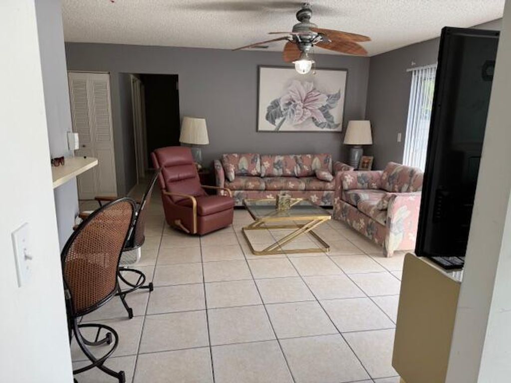Photo of 3957 NW Cinnamon Tree Circle, Jensen Beach, FL 34957 (MLS # R11105645)