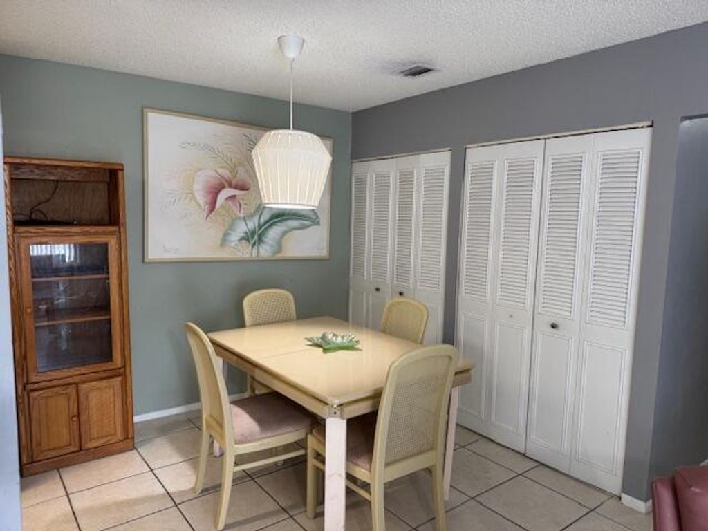 Photo of 3957 NW Cinnamon Tree Circle, Jensen Beach, FL 34957 (MLS # R11105645)