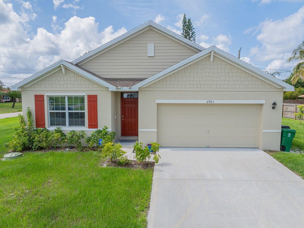 Photo of 2901 SW Boxwood Circle, Port Saint Lucie, FL 34953 (MLS # F10507264)