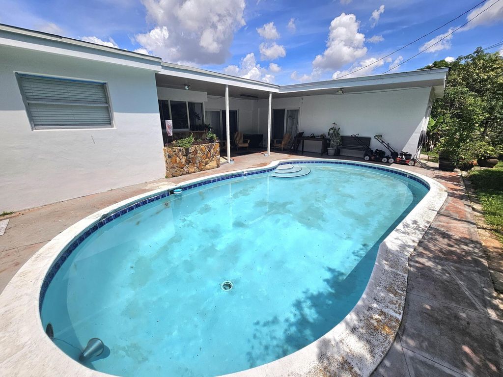 Photo of 4021 E Shore Road, Miramar, FL 33023 (MLS # B26025701)