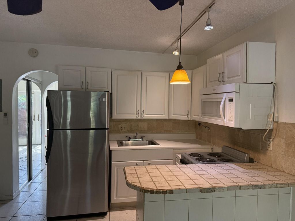 Photo of 3251 SW 44th Street #100, Dania Beach, FL 33312 (MLS # B26029525)