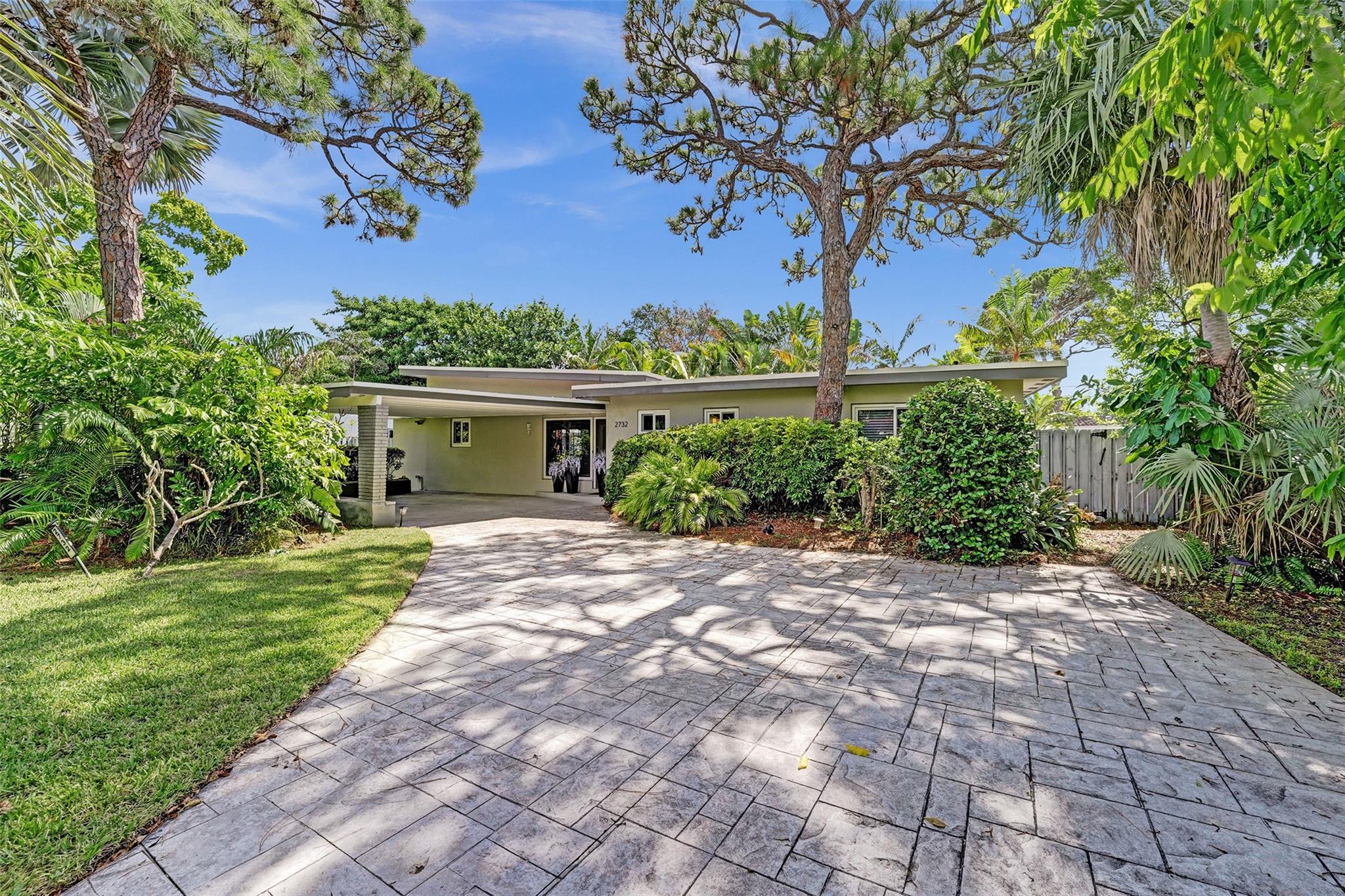 MID CENTURY LIVING IN DESIRABLE WILTON MANORS! DON’T MISS THIS 3 BEDROOM 2 BATH POOL HOME WITH 2 CAR ATTACHED CARPORT! AMAZING ENTERTAINING SPACE – WITH EXTRA HIGH CEILINGS IN THE MAIN LIVING AREAS! ART-DECO ACCENTS AND BEAUTIFUL TERRAZZO FLOORING THROUGHOUT! GRANITE KITCHEN WITH STAINLESS STEEL APPLIANCES! GENEROUS SIZED OWNER’S SUITE! FAMILY ROOM WITH TONS OF WINDOWS OFF MAIN LIVING AREA! MASSIVE POOL WITH BUILT IN SPA! PATIO AREAS PERFECT FOR OUTDOOR DINING AND SUNNING! IMPACT WINDOWS THROUGHOUT! CLOSE TO WILTON DRIVE, RESTAURANTS AND THE BEACH! THIS IS A MUST SEE!