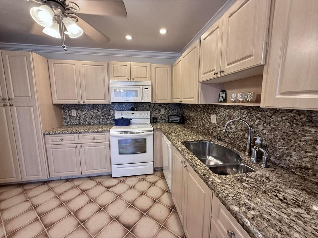 Photo of 1660 NW 20th Avenue #101, Delray Beach, FL 33445 (MLS # B26001212)