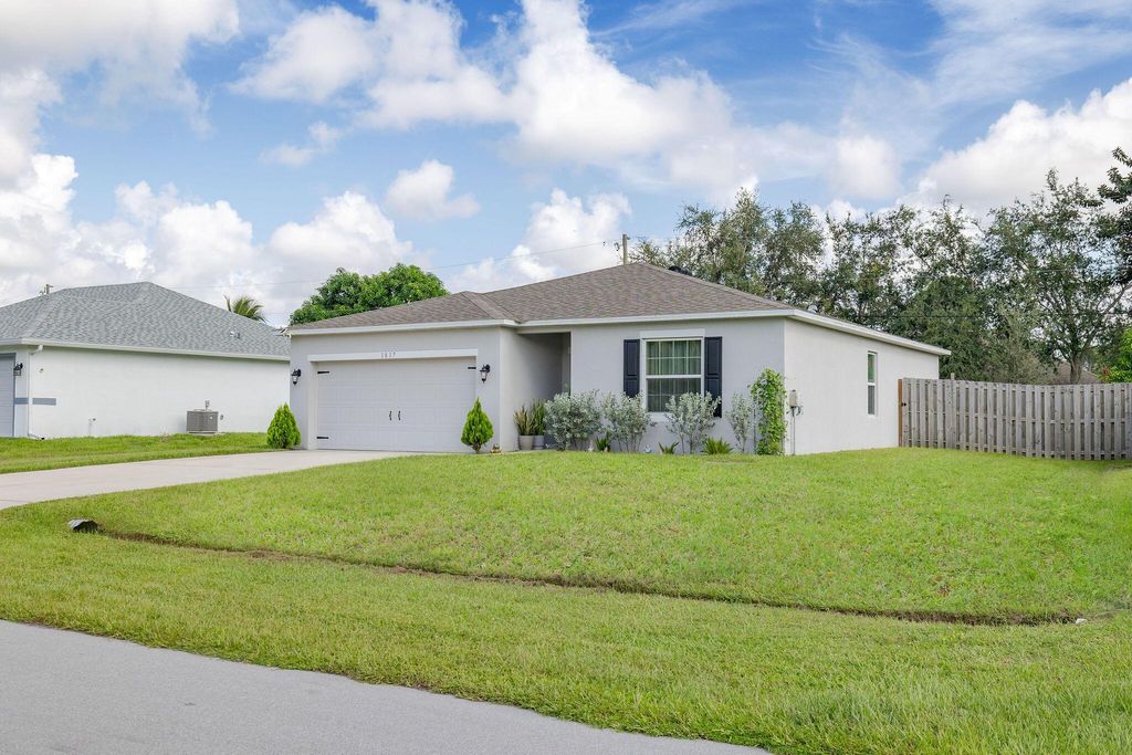 Photo of 1817 SW Effland Avenue, Port Saint Lucie, FL 34953 (MLS # R11011631)