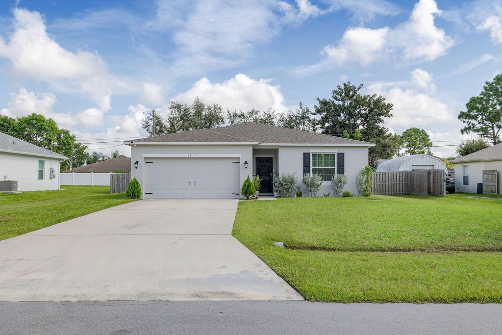 Photo of 1817 SW Effland Avenue, Port Saint Lucie, FL 34953 (MLS # R11011631)