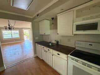 Photo of 7300 NW 4th Place #105, Margate, FL 33063 (MLS # B26065599)