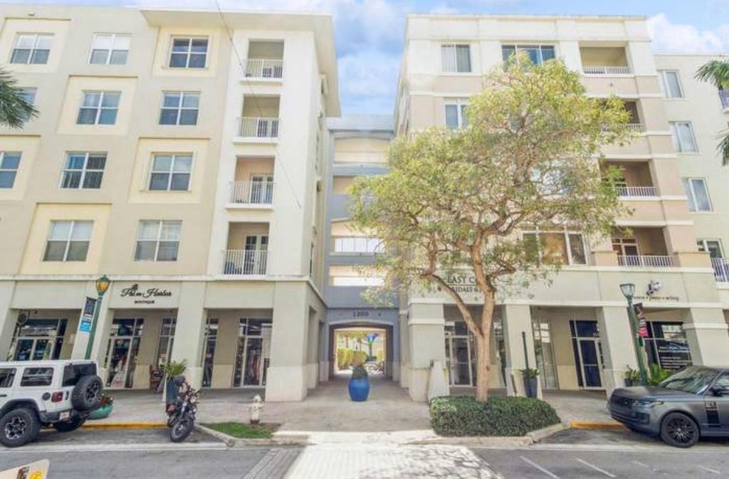 Photo of 1200 Town Center Drive #305, Jupiter, FL 33458 (MLS # B26036389)