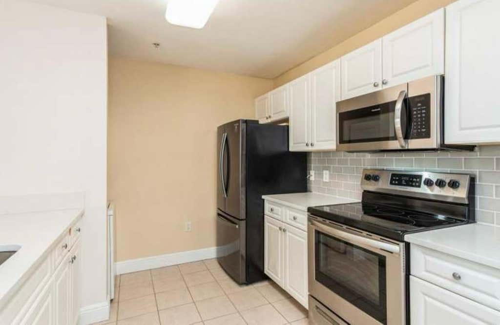 Photo of 1200 Town Center Drive #305, Jupiter, FL 33458 (MLS # B26036389)