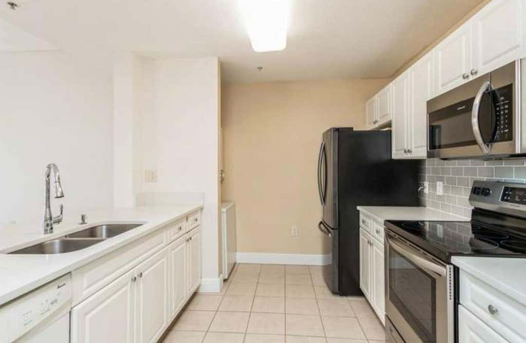 Photo of 1200 Town Center Drive #305, Jupiter, FL 33458 (MLS # B26036389)