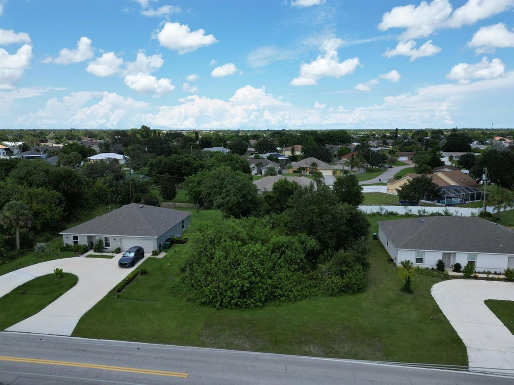 Photo of 3875 SW Port St Lucie Boulevard, Port St Lucie, FL 34953 (MLS # R10908792)