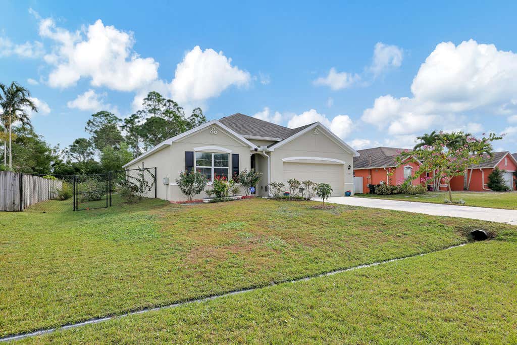 Photo of 1541 SW Avens Street, Port Saint Lucie, FL 34983 (MLS # R10946417)