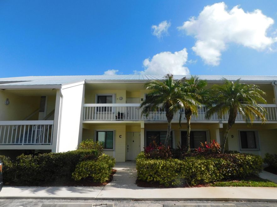 This Golf Condo has been completely renovated w contemporary cabinets, quartz countertops, modified kitchen,SS appliances, new vanities & light fixtures in bathrooms and it is a beautiful condo.  Overlooking the Golf Course, hole #1 from this lovely screened-in lanai. Coffee, sunrises and Golf are a match made in heaven.  Vaulted ceilings make this unit feel large and airy.  The wood floors throughout are gorgeous and just the right medium shade for any decor.  BRAND NEW METAL ROOF. Maintenance fees include all exterior maintenance, shrubs, grass, paint, roof, sidewalks, sprinklers, parking lot and High-Speed Internet & TV are Included and a small storage room. There is a large community pool and Gator Trace Clubhouse available for use every day.  Accordian Storm shutters are included. Memberships available but NOT mandatory. The Gator Trace Clubhouse is open to the public and is open every day for lunch & drinks, Friday night dinners & Sundays for Brunch. Come see our "Hidden Gem" on the Treasure Coast and the new Port of Fort Pierce, Downtown Marinas, St Lucie River, Beaches and Historic Sunrise Theatre.  Bird watching here is some of the finest.  What a lovely and historical City Fort Pierce is!