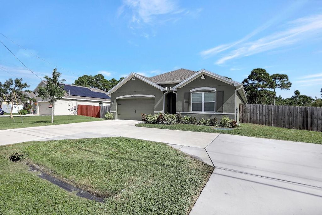 Photo of 3681 SW Rosser Boulevard, Port Saint Lucie, FL 34953 (MLS # R10942043)